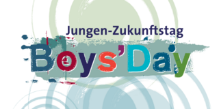 Schriftmarke des Boys' Day mit der Überschrift Jungen-Zukunftstag vor mehreren Bunten Kreisen.